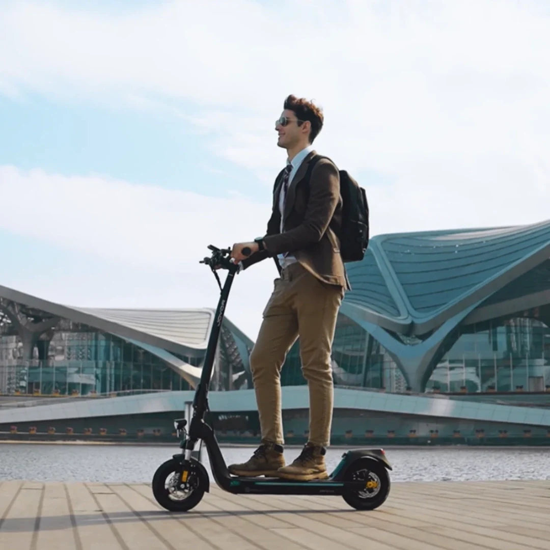 Man riding JOYOR ABE certified road legal electric scooter for daily city commute, EU legal adult foldable e-scooter