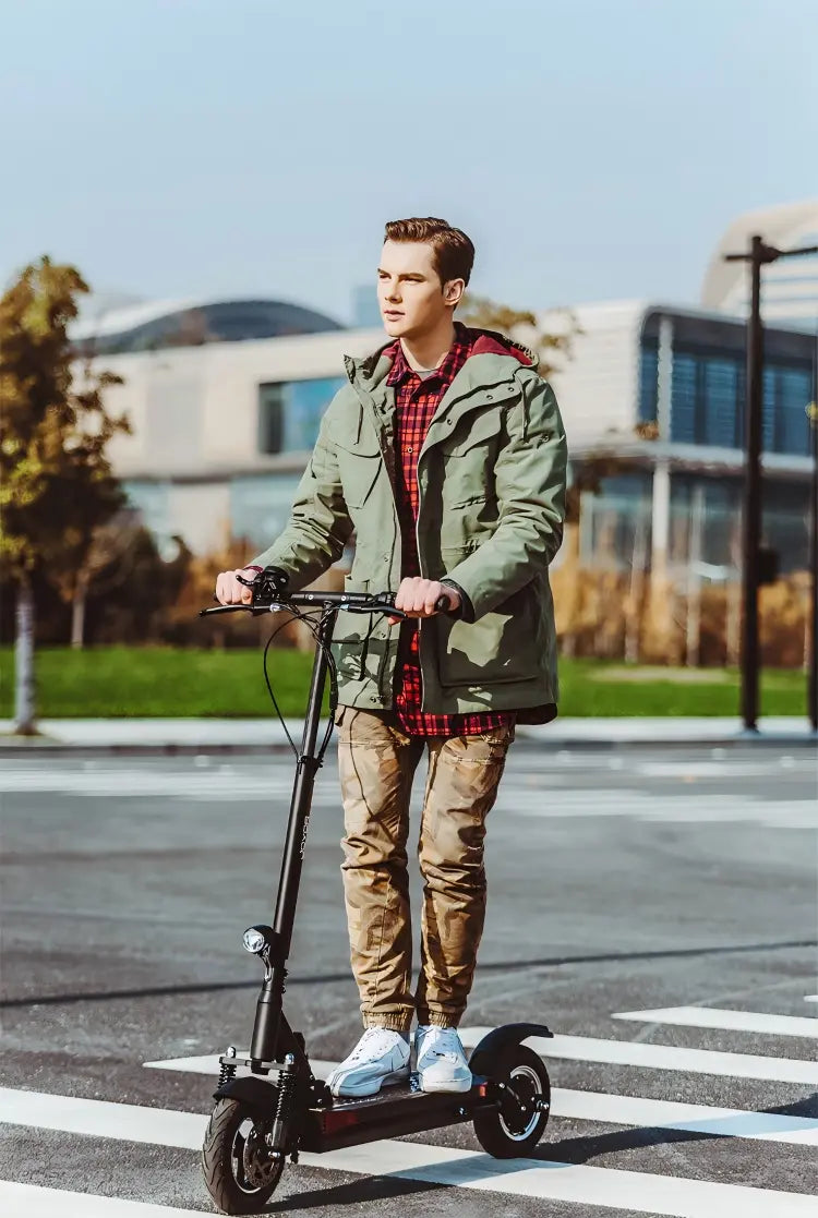 Video laden: Urban commuting video of Joyor Y8-S lightweight foldable electric scooter, showing slim portable design and smooth daily city road riding experience